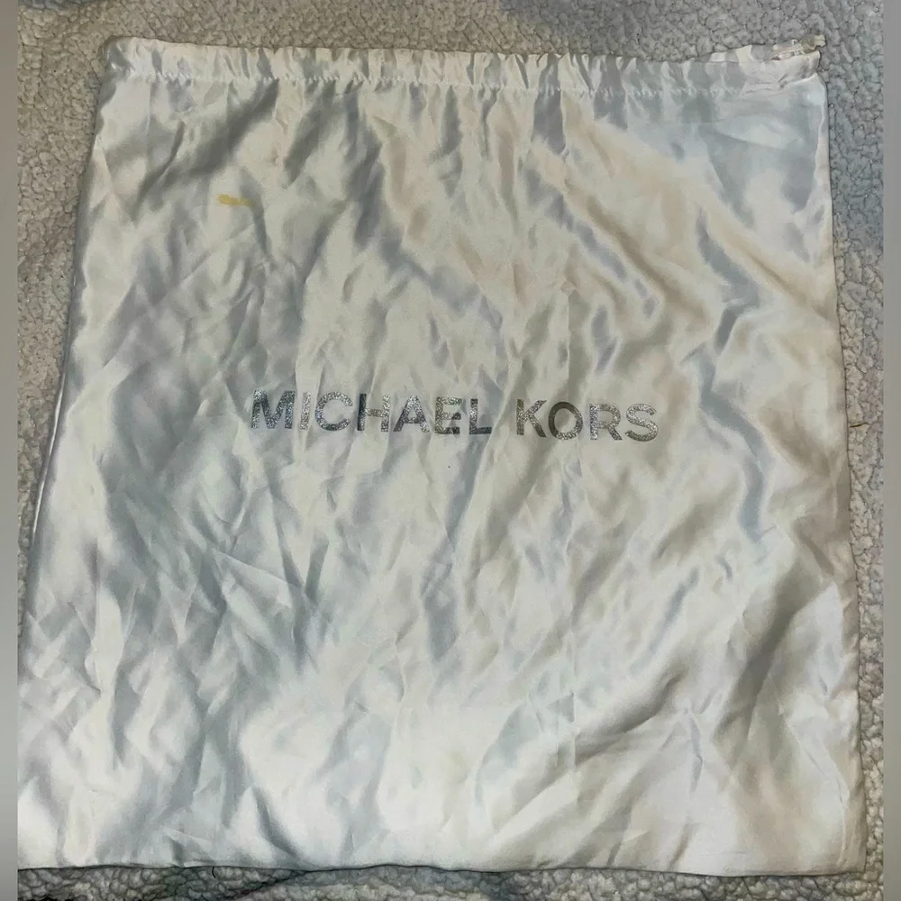 Michael Kors garment bag.